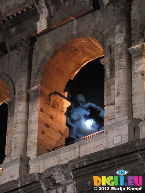 SX31581 Moon lit clouds through arch of Colosseum